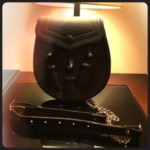 Black Handmade leather bag.